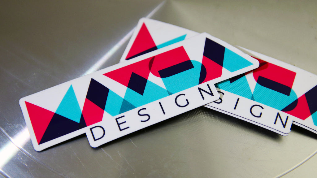Die cut magnet with MAXSA design logo printed on