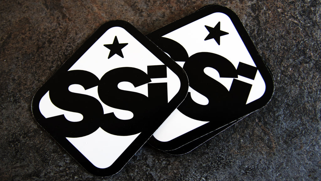 Die cut magnet printed onto white vinyl with ssi logo