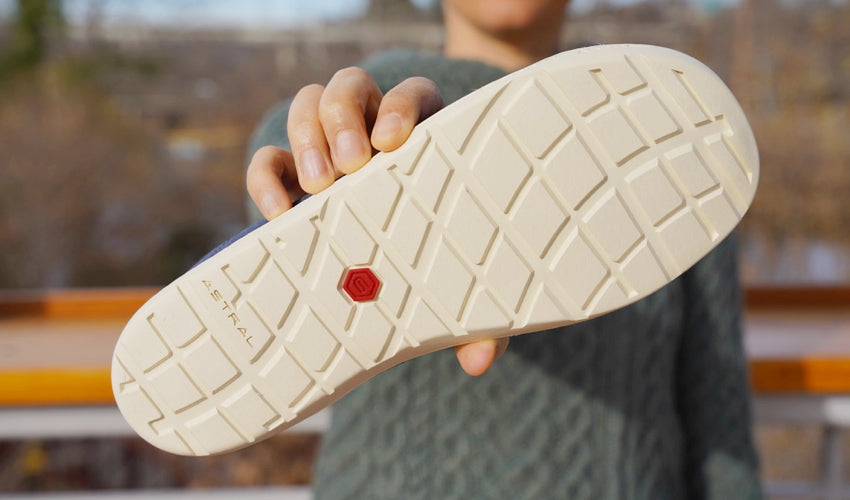 Close-up view of the sole and tread pattern of an Astral Loyak shoe