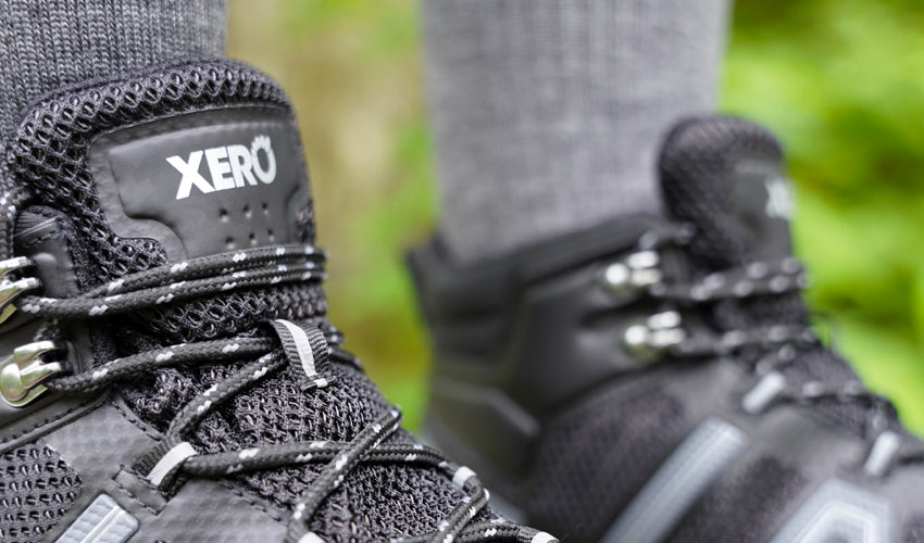 Close-up image showing the upper detail on a pair of Xero Xcursion Fusion boots