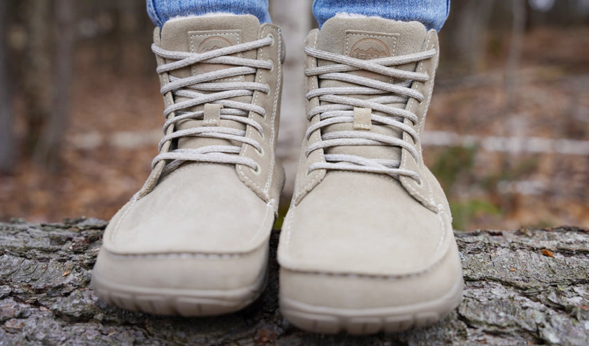 A close-up, head-on view of pair of Lems Telluride Boots in the Limestone colorway