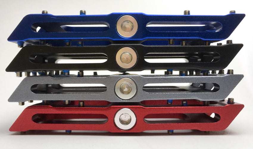 A close-up view of a stack of four Catalyst Pedals