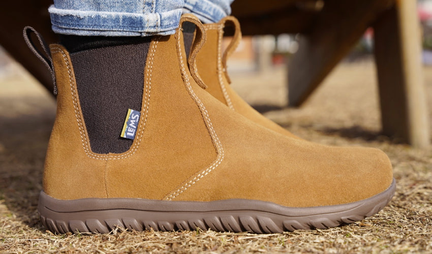 Close-up side view of a Lems Chelsea Boot Cedar boot