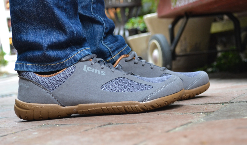 A close-up side view of a pair of Lems Primal 2 Slate shoes
