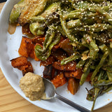 Plate the vegetable on a serving place and top with sesame seeds to serve! 