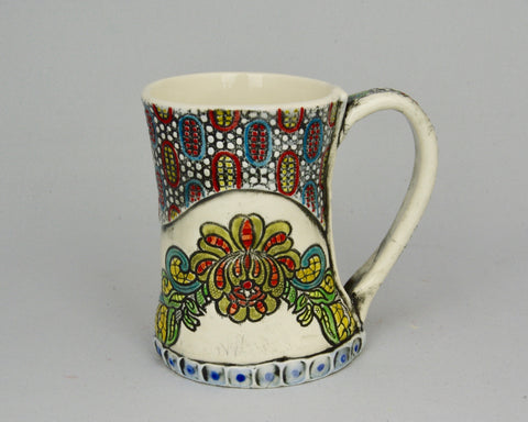 Handmade mug with flowers and lace design in many colours.