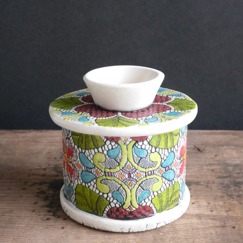 French butter dish with a colourful flower design.