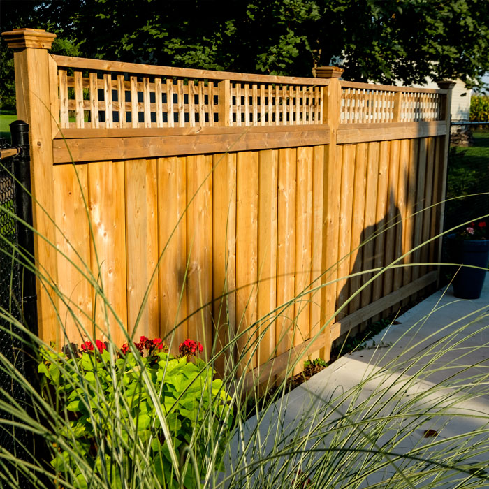 Traditional cedar fence with lattice feature