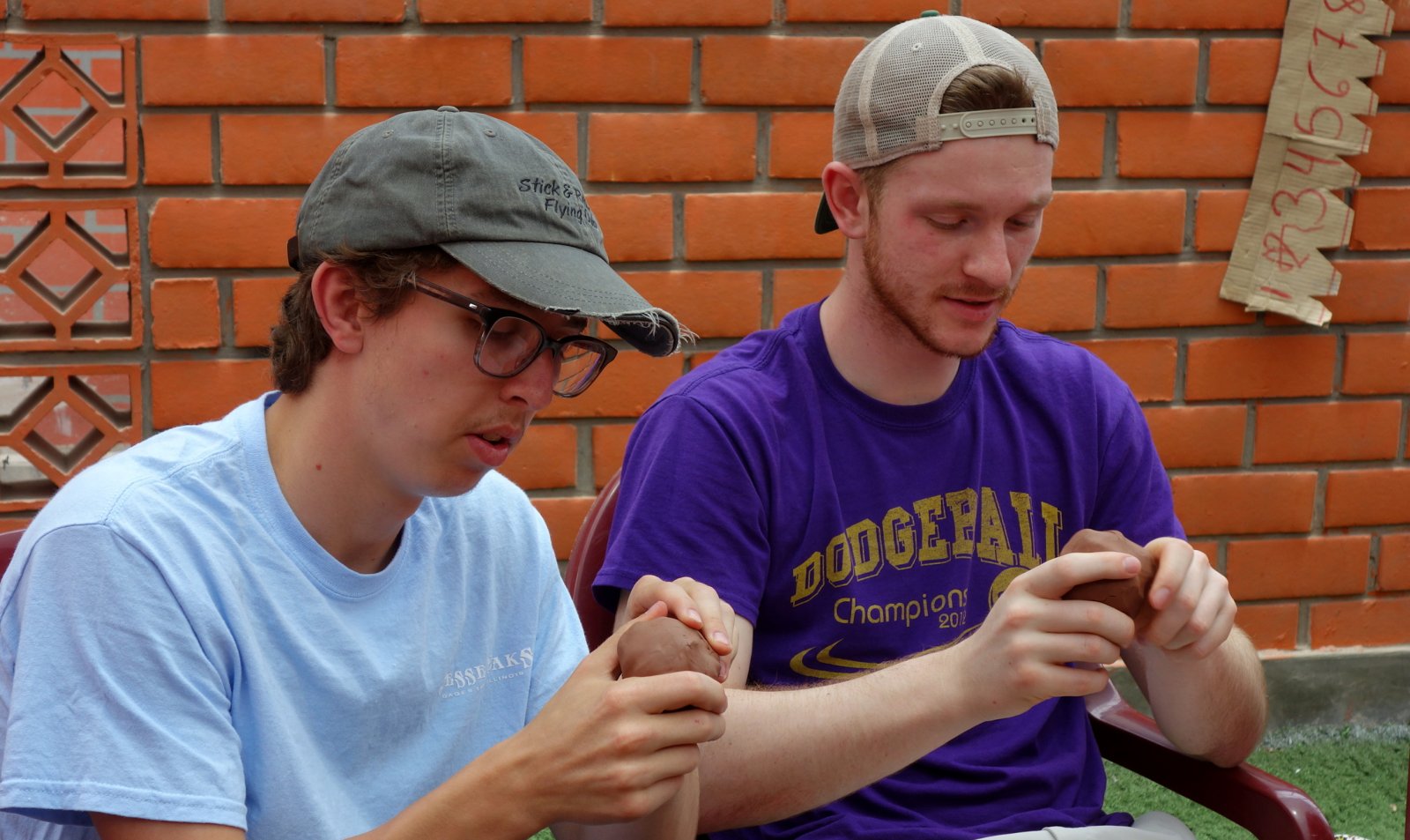 Goshen Student, Isaac Longenecker, pictured on the left, visits Manos Amigas in Peru.