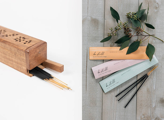 A split image of the Acacia Wood Incense Box and a collection of stick incense made by fair trade artisans working with Silence in India. Incense are laid out together with a sprig of greenery on a wood background. 