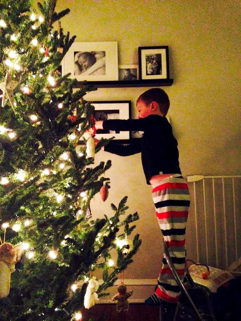 Our Christmas Tree Story. Traditions make way for tiny hands to try things their way.