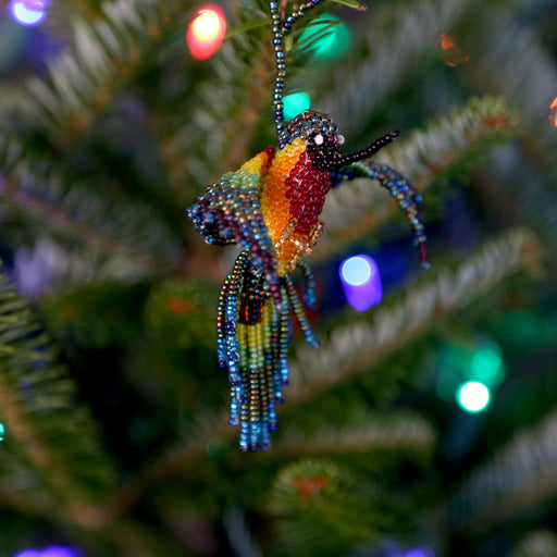 Finished the peacock themed tree, crowned with a life sized peacock :  r/ChristmasDecorating