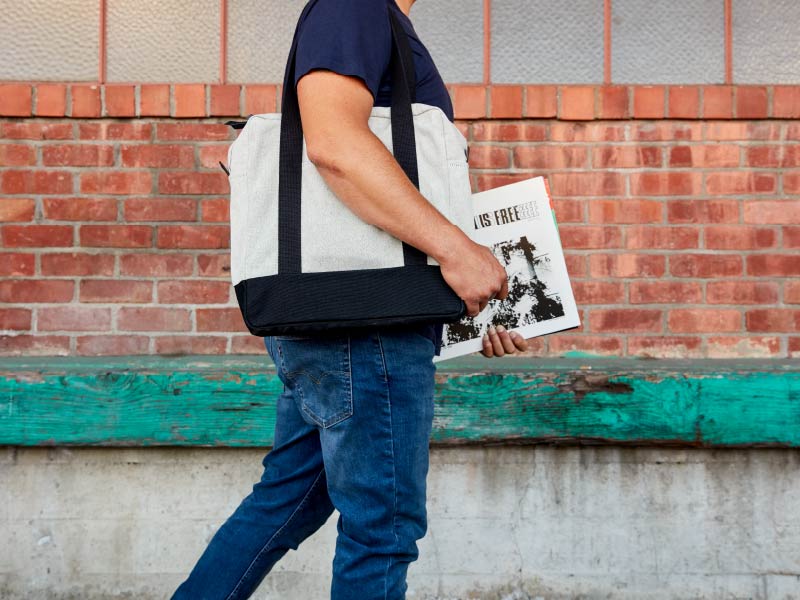 Vinyl record carrying tote with a wood base by Koeppel Design