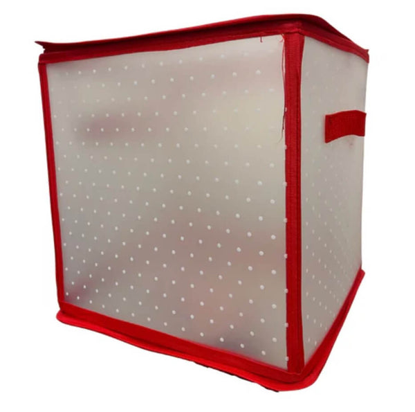 Red fabric storage box with white polka dots and a zipper.