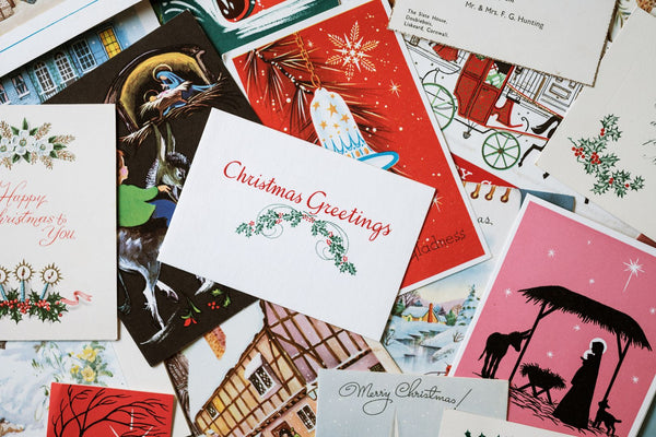 Assortment of colorful vintage Christmas cards.
