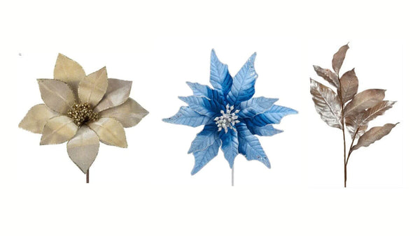 Three artificial flowers in gold and blue color.