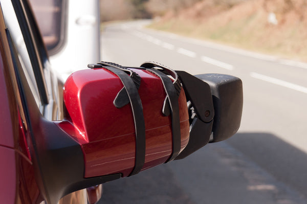 A towing mirror mounted with rubber straps