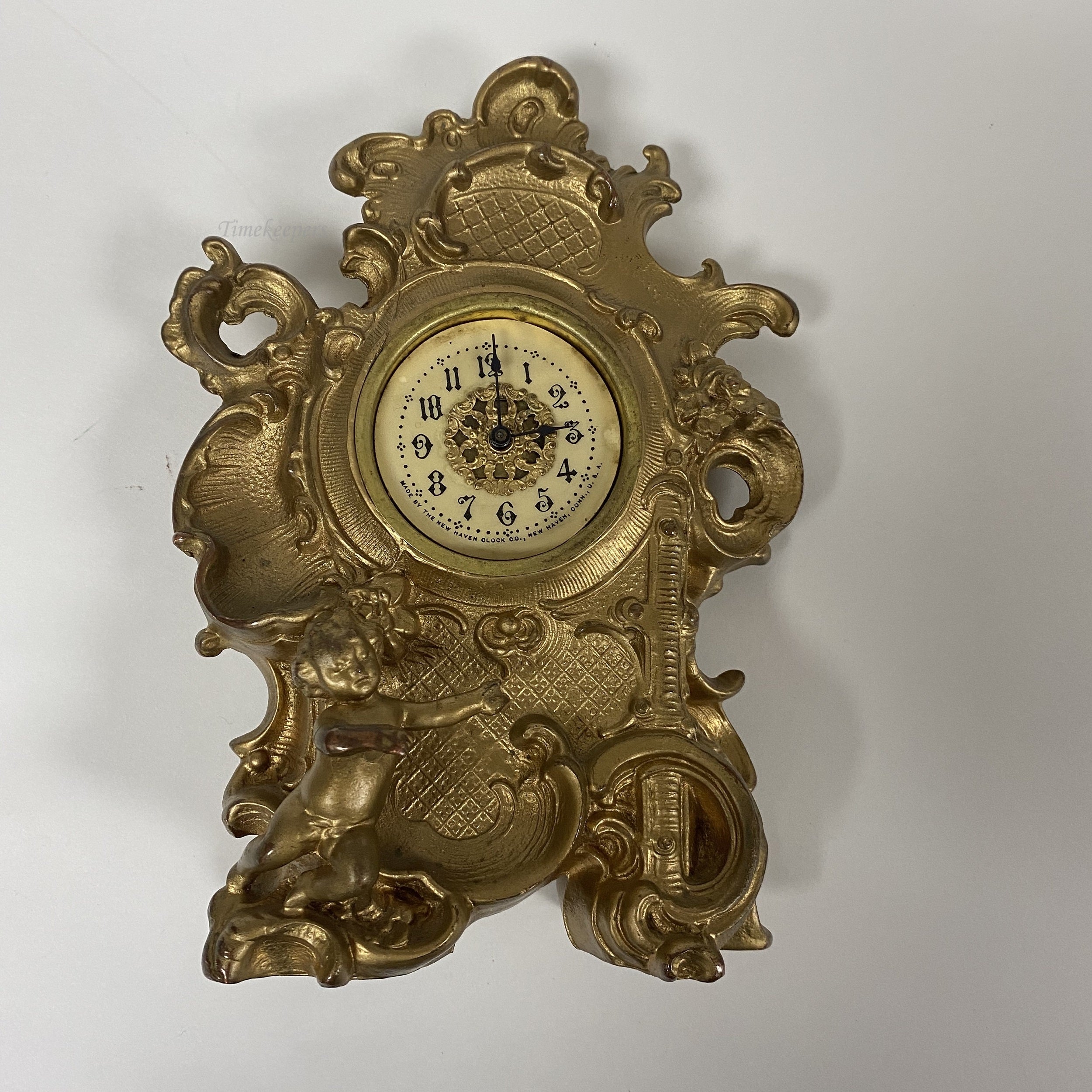 Eximious brass birdcage machine clock with bird inside Height
