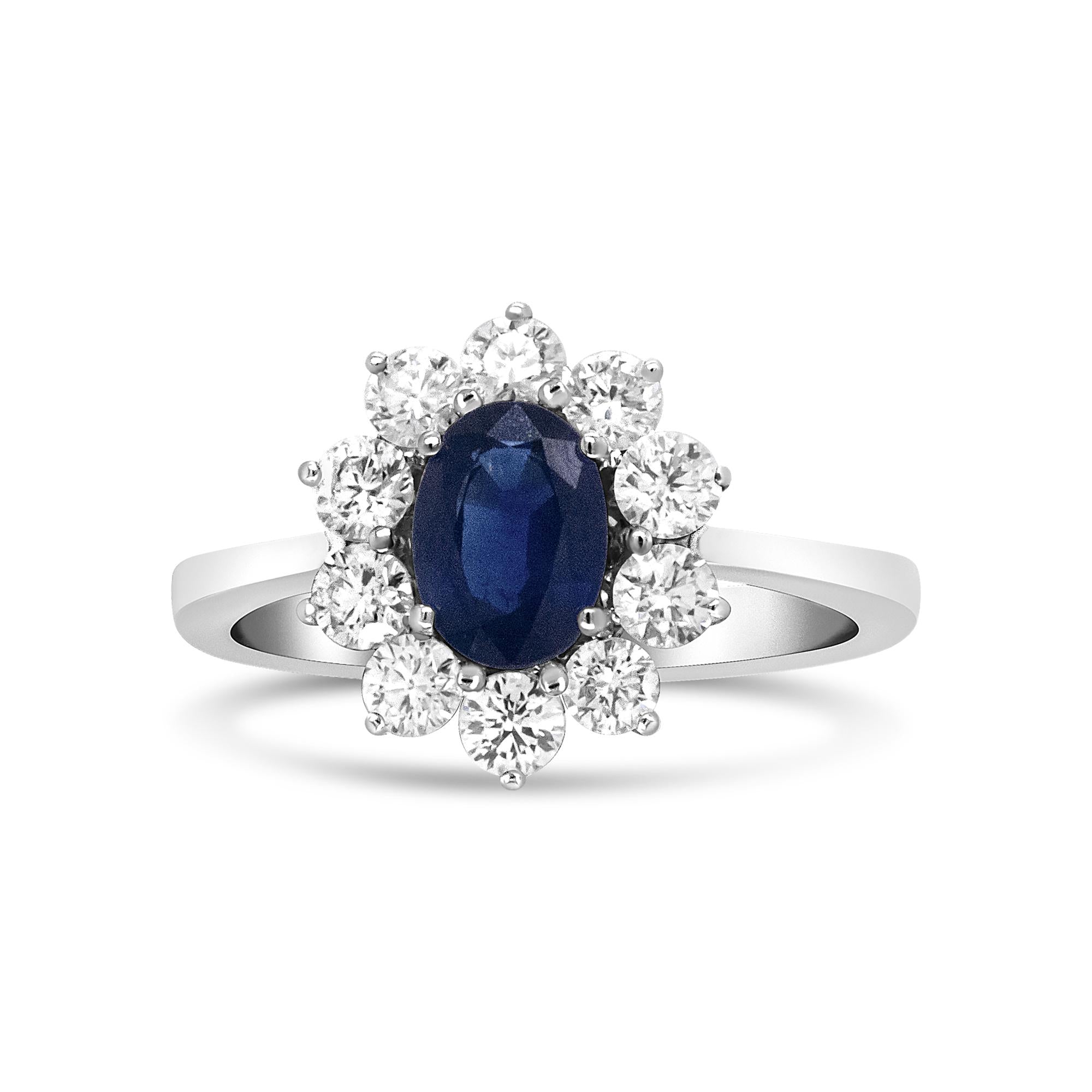 ''18K White Gold 7x5 mm Oval Cut Blue Sapphire and Round Diamond 3/4 Cttw Sunburst Halo Ring (F-G Col
