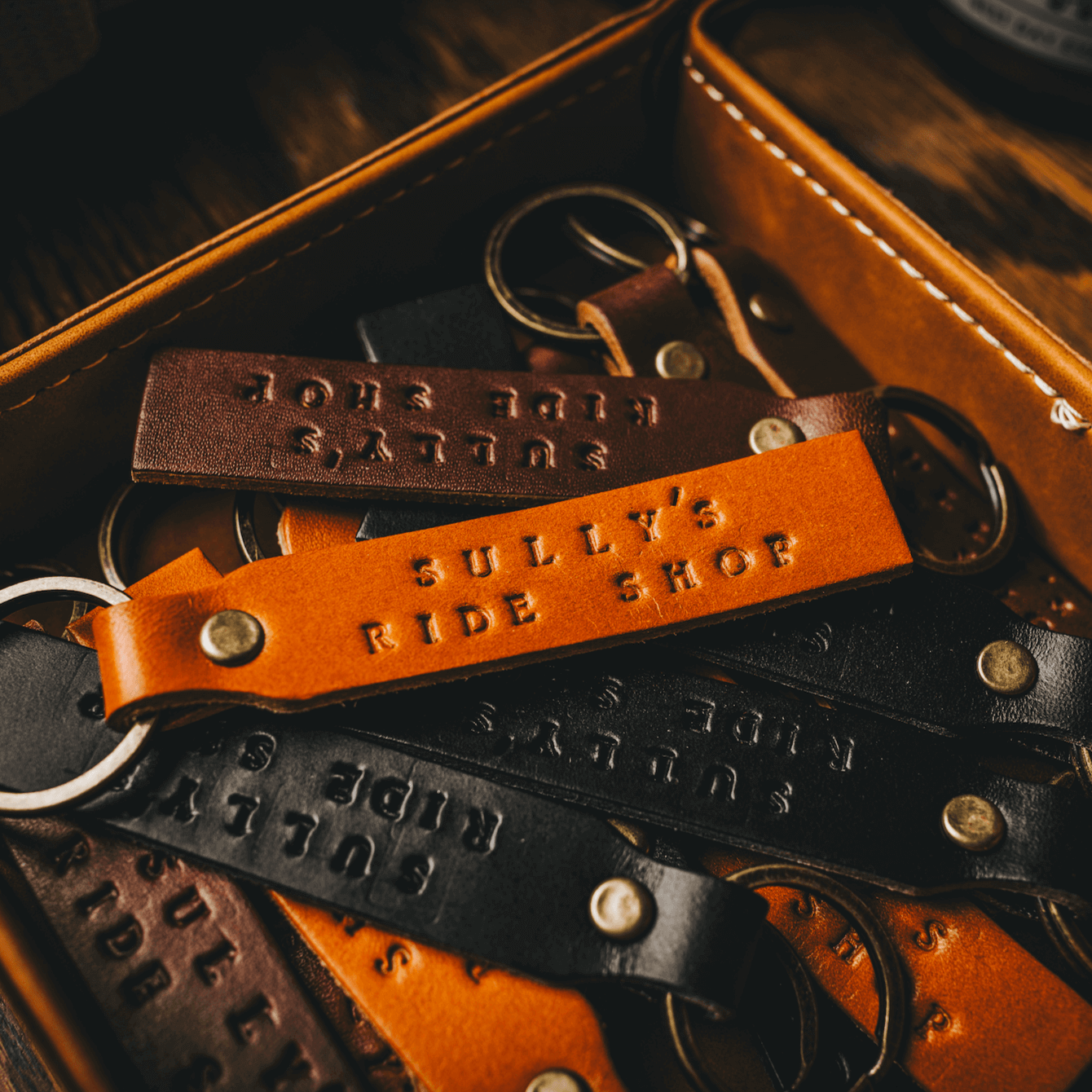 Sully's Leather Key Chain variants arranged for display