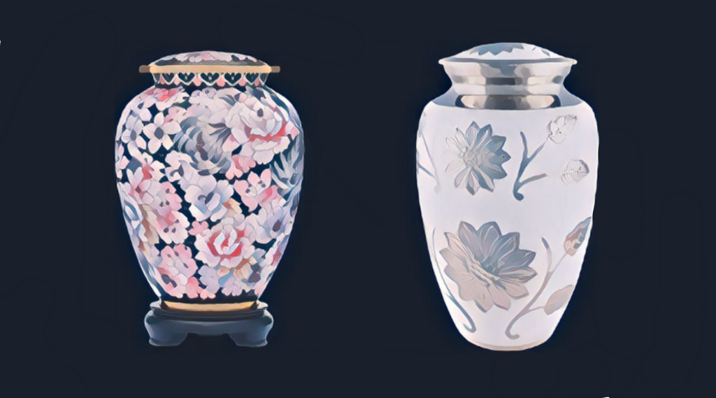 Two flower patterned urns side by side
