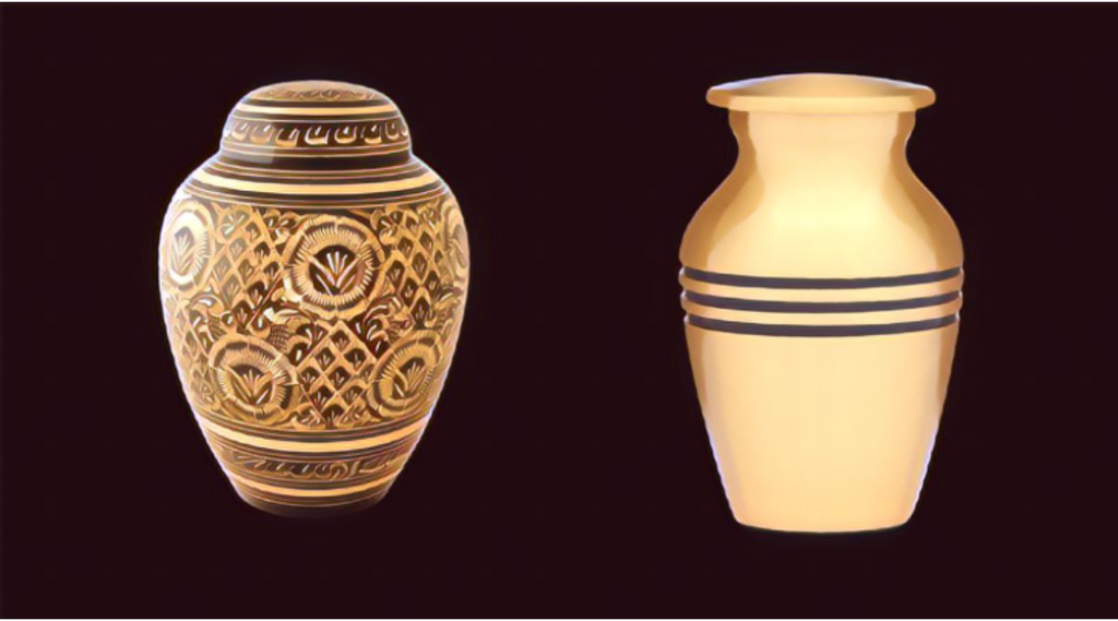 Ornate brass urn on left with more traditional brass urn on right