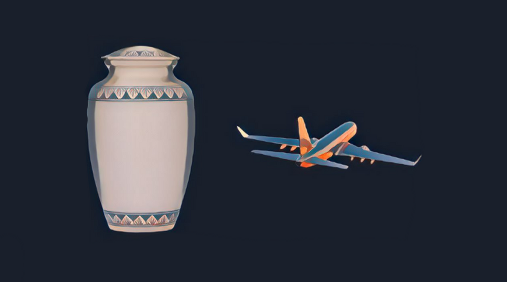 Silver metal urn on left with aeroplane on right