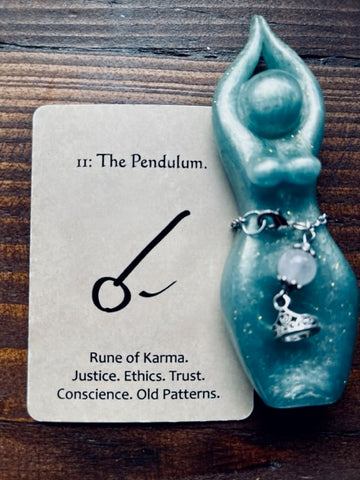 womanrunes and goddess statue the pendulum