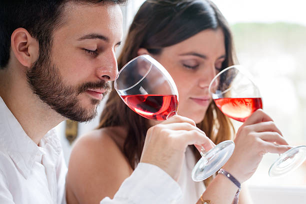 Couple smelling Rosé wine