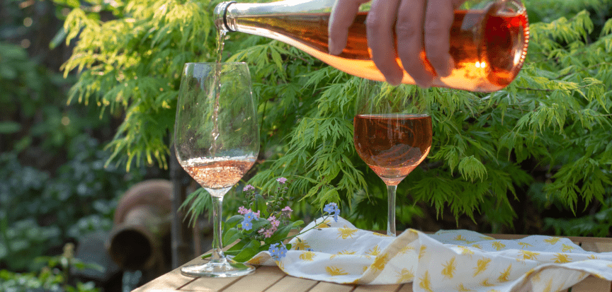 Pouring a glass of orange wine