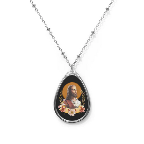 A Christian necklace for women featuring an oval pendant with a picture of Jesus.