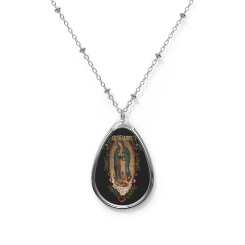Nuestra Senora de Guadalupe Oval Necklace: A religious pendant featuring the image of Our Lady of Guadalupe in an oval shape.