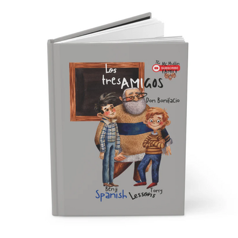 The personalized Christian gift features a Spanish book with two children and a teacher, beautifully illustrated.