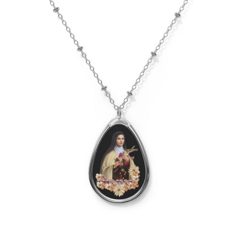 Saint Therese of Lisieux Oval Necklace - A delicate oval pendant featuring the image of Saint Therese of Lisieux. Perfect for religious jewelry lovers.