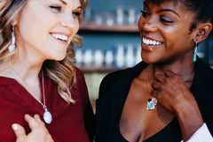 two fun-loving women laughing 