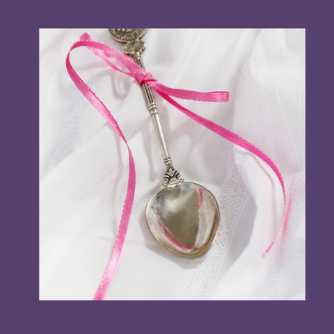 silver-spoon-with-pink-ribbon-for-baby-girl
