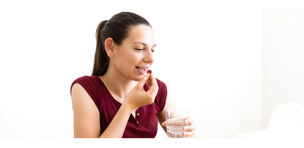 Woman eating gummies