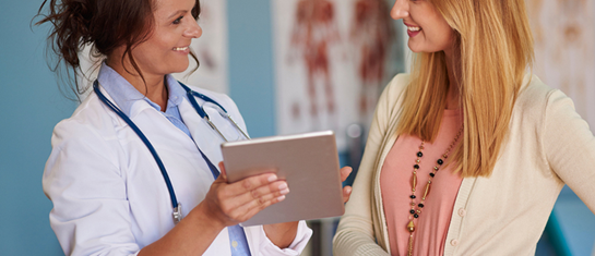 woman talking with doctor