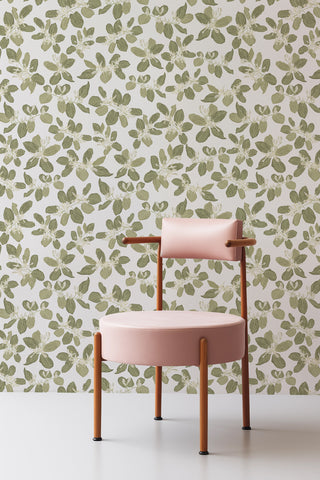 Honeysuckles wallpaper by Kate Golding with pink vintage chair.