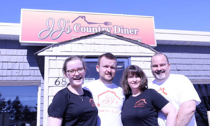 JJ's Family Photo in front of JJ's Country Diner