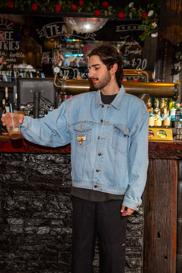 Light-wash blue in colour, this dandy looking denim jacket has double breast pockets, double side pockets, a 'mercury' patch on the right chest pocket and a large old school car print on the back repping Route 66.