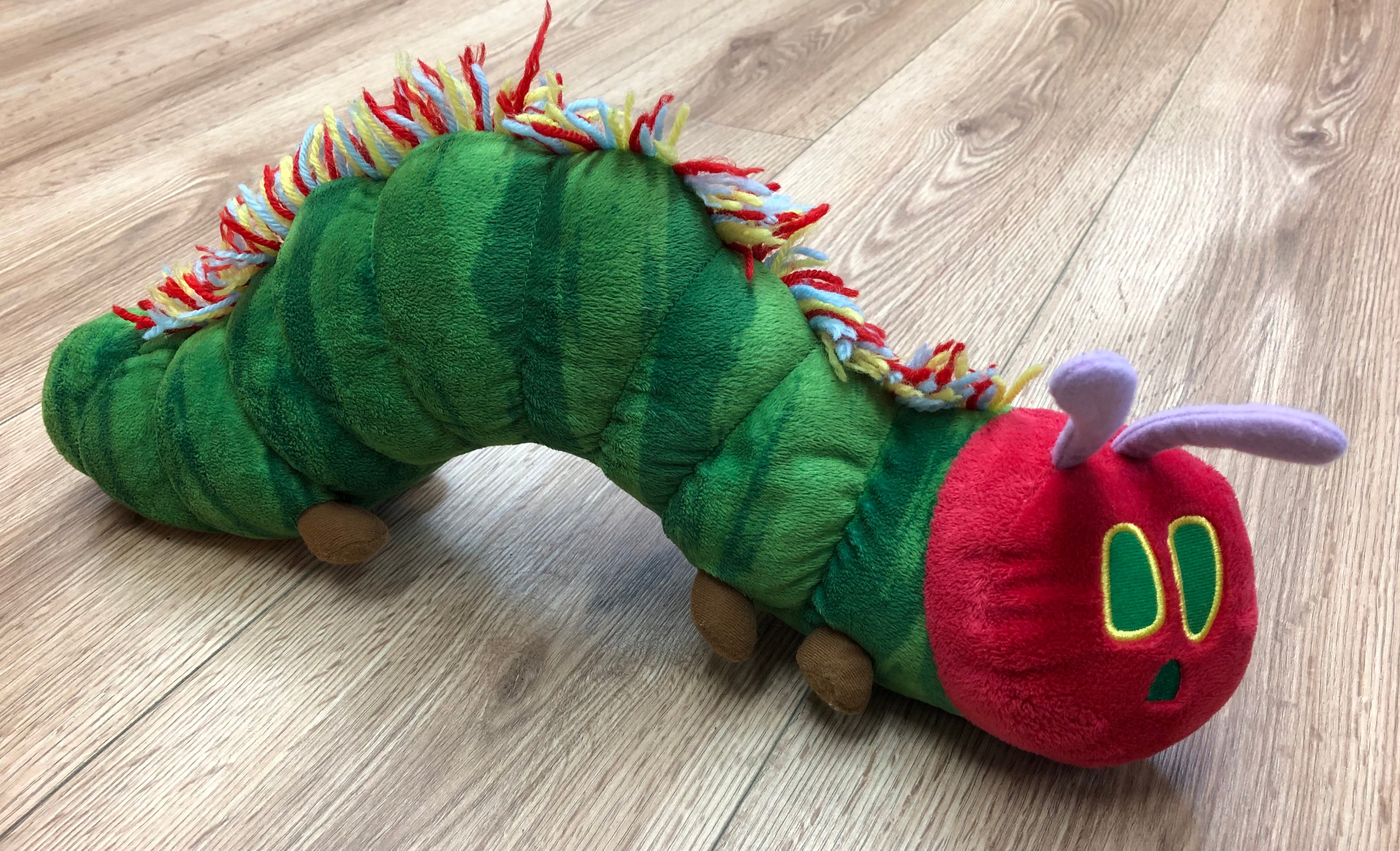 Eric Carle “The Very Hungry Caterpillar” stuffed animal with the framed painted very hungry caterpillar!
