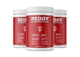 Three containers of REDDY superfood powder with health claims on the labels.