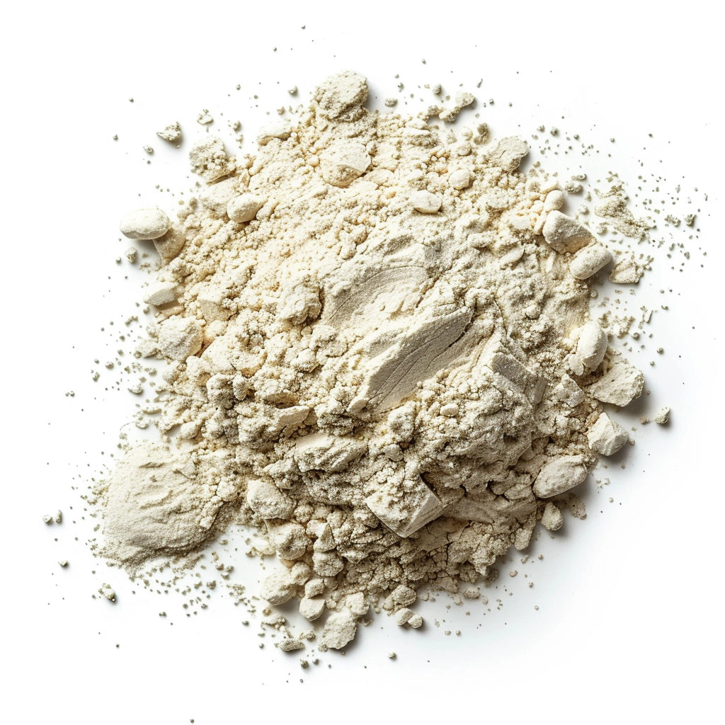 A pile of beige powder on a white background.