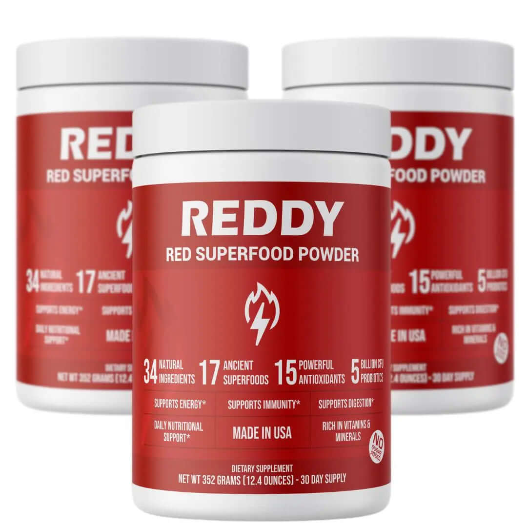 Three containers of REDDY Red Superfood Powder dietary supplement.