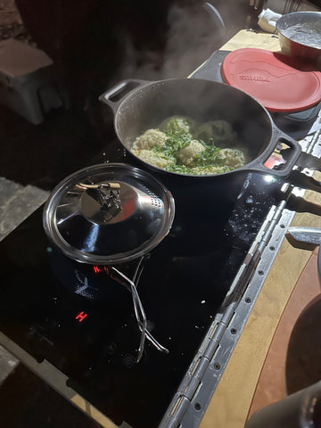 chicken and dumplings on the Rivian R1T camp kitchen stove