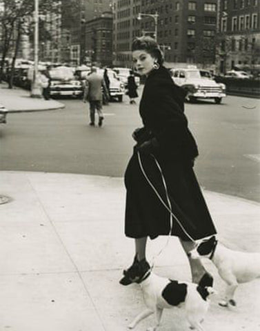 McLaughlin-Gill, Frances. Model Walking Two Jack Russell Terriers, NYC. 1953.