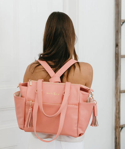 Coral Gemini Mini Versatility at its Finest - from Purse to Backpack, this Bag is for the Modern Multitasker Wanting to Make a Statement.