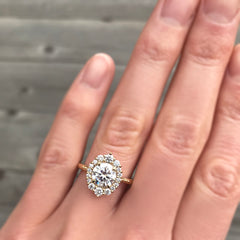 Conflict-free Diamond Center with a diamond halo in 14k yellow gold