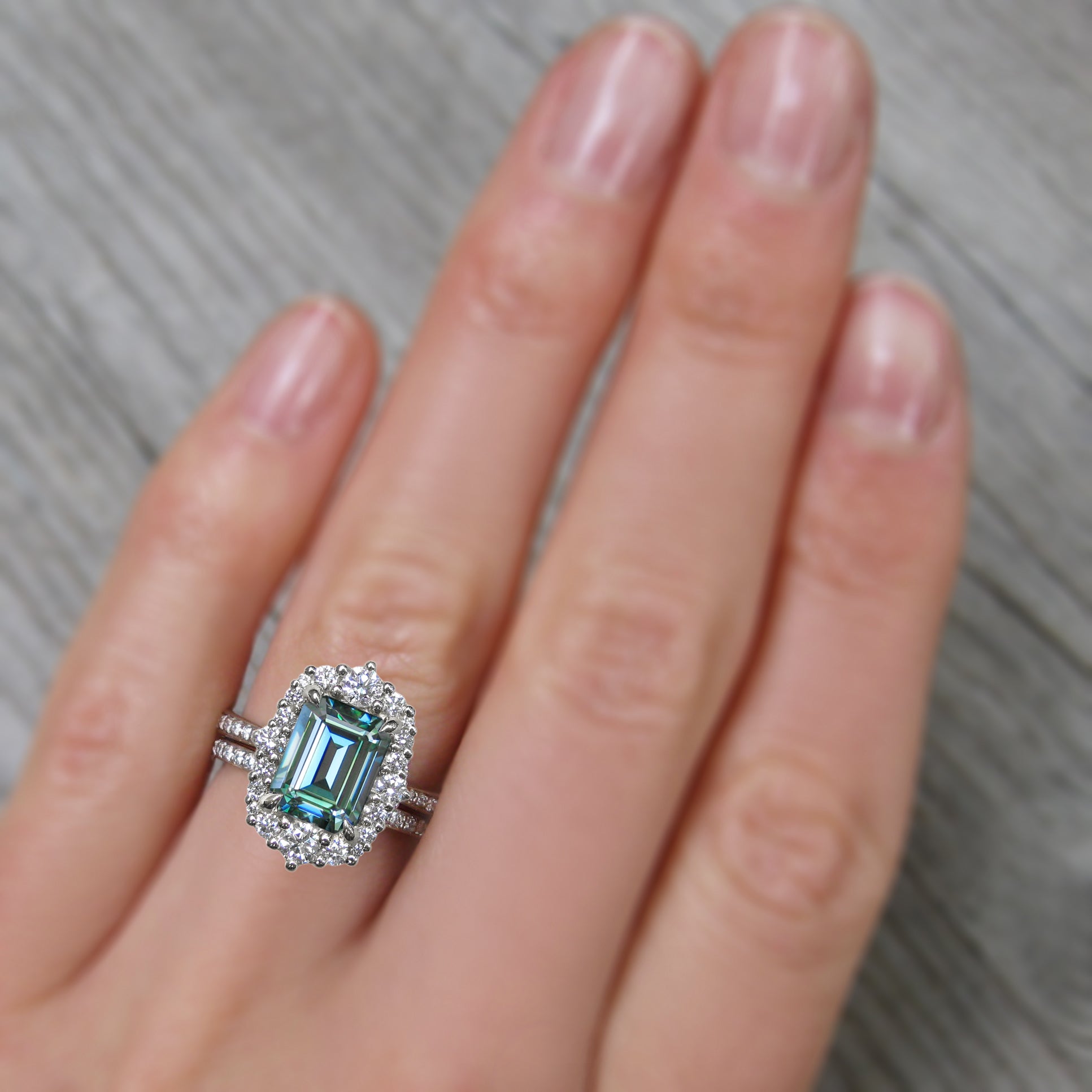 <center><strong> ADELINE </strong><br></center>Aqua-Teal Iconic  Emerald Cut Moissanite Center, Diamond Halo (2.27ctw, Ready to Ship)